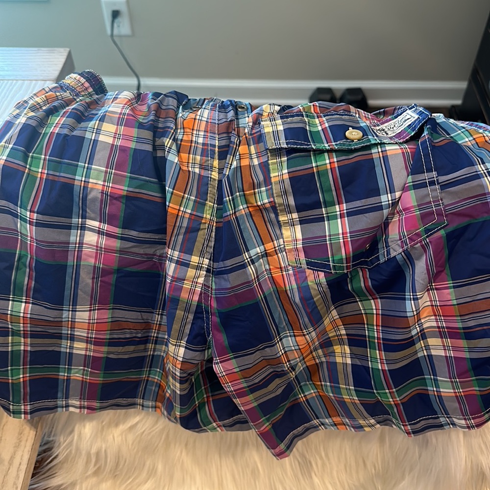 Men’s plaid swim trunks. Warn 2 x size large